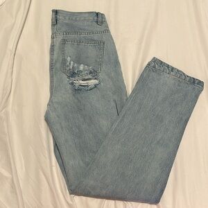 Light Wash Flare Jeans with Distressed Back Pocket